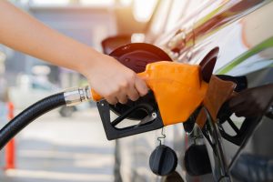 close up of someone gassing up their car
