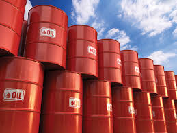 red cans of Oil stacked