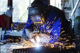 welder with sparks flying